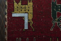Backside of handmade 2000s Shiraz rug showing knot structure and weave density