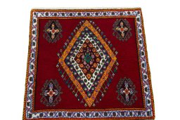Surface texture of 2000s Shiraz rug with natural Wool and intricate pattern