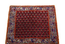 Surface texture of 2000s Shiraz rug with natural Wool and intricate pattern