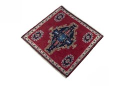Corner detail of 2000s Shiraz rug showing border pattern and Wool pile