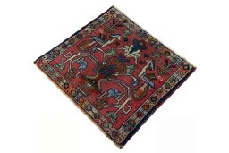 Corner detail of 2000s Shiraz rug showing border pattern and Wool pile