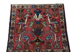 Surface texture of 2000s Shiraz rug with natural Wool and intricate pattern