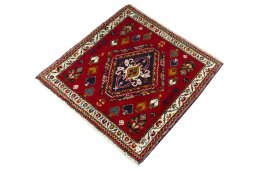 Corner detail of 2000s Shiraz rug showing border pattern and Wool pile