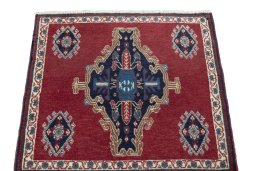 Surface texture of 2000s Shiraz rug with natural Wool and intricate pattern