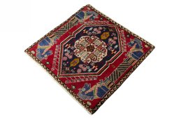 Corner detail of 2000s Shiraz rug showing border pattern and Wool pile