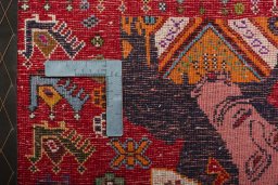 Backside of handmade 2000s Shiraz rug showing knot structure and weave density