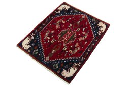 Corner detail of 2000s Shiraz rug showing border pattern and Wool pile