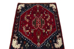 Surface texture of 2000s Shiraz rug with natural Wool and intricate pattern