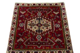 Surface texture of 2000s Shiraz rug with natural Wool and intricate pattern