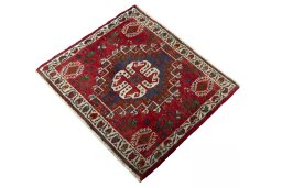Corner detail of 2000s Shiraz rug showing border pattern and Wool pile