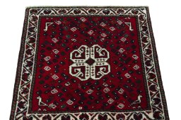 Surface texture of 2000s Shiraz rug with natural Wool and intricate pattern