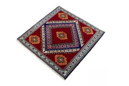 Corner detail of 2000s Shiraz rug showing border pattern and Wool pile