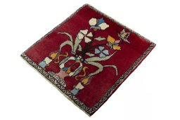 Corner detail of 2000s Shiraz rug showing border pattern and Wool pile