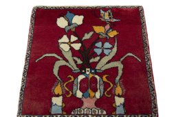 Surface texture of 2000s Shiraz rug with natural Wool and intricate pattern