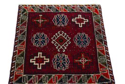 Surface texture of 2000s Shiraz rug with natural Wool and intricate pattern