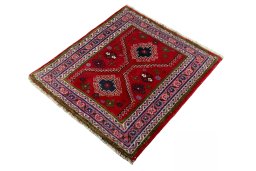 Corner detail of 2000s Shiraz rug showing border pattern and Wool pile