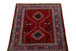Surface texture of 2000s Shiraz rug with natural Wool and intricate pattern