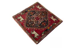 Corner detail of 2000s Shiraz rug showing border pattern and Wool pile