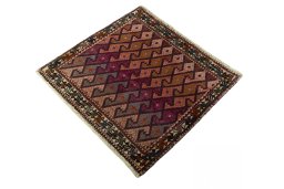 Corner detail of 2000s Shiraz rug showing border pattern and Wool pile