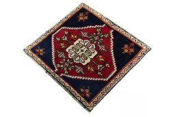 Corner detail of 2000s Shiraz rug showing border pattern and Wool pile