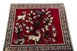 Surface texture of 2000s Shiraz rug with natural Wool and intricate pattern