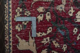 Backside of handmade 2000s Shiraz rug showing knot structure and weave density
