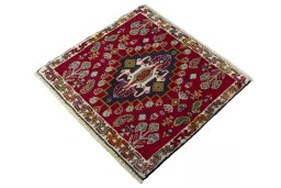 Corner detail of 2000s Shiraz rug showing border pattern and Wool pile