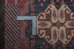 Backside of handmade 2000s Shiraz rug showing knot structure and weave density