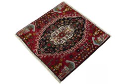 Corner detail of 2000s Shiraz rug showing border pattern and Wool pile