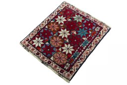 Corner detail of 2000s Shiraz rug showing border pattern and Wool pile