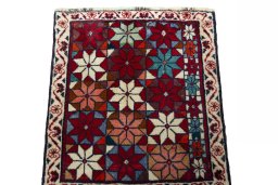 Surface texture of 2000s Shiraz rug with natural Wool and intricate pattern