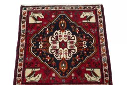 Surface texture of 2000s Shiraz rug with natural Wool and intricate pattern