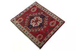 Corner detail of 2000s Shiraz rug showing border pattern and Wool pile