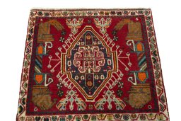 Surface texture of 2000s Shiraz rug with natural Wool and intricate pattern