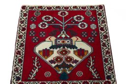 Surface texture of 2000s Shiraz rug with natural Wool and intricate pattern
