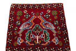 Surface texture of 2000s Shiraz rug with natural Wool and intricate pattern