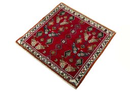 Corner detail of 2000s Shiraz rug showing border pattern and Wool pile