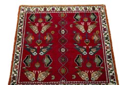Surface texture of 2000s Shiraz rug with natural Wool and intricate pattern