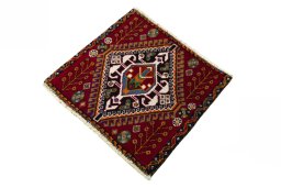 Corner detail of 2000s Shiraz rug showing border pattern and Wool pile