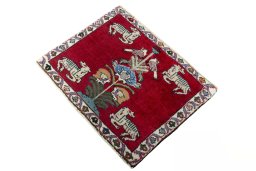 Corner detail of 2000s Shiraz rug showing border pattern and Wool pile