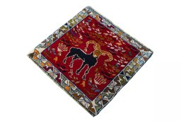 Corner detail of 2000s Shiraz rug showing border pattern and Wool pile
