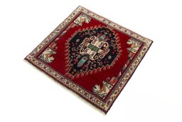 Corner detail of 2000s Shiraz rug showing border pattern and Wool pile