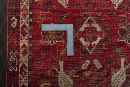 Backside of handmade 2000s Shiraz rug showing knot structure and weave density