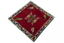Corner detail of 2000s Shiraz rug showing border pattern and Wool pile