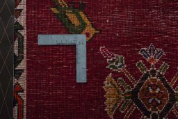 Backside of handmade 2000s Shiraz rug showing knot structure and weave density