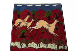 Surface texture of 2000s Shiraz rug with natural Wool and intricate pattern