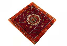 Corner detail of 2000s Shiraz rug showing border pattern and Wool pile