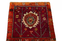Surface texture of 2000s Shiraz rug with natural Wool and intricate pattern
