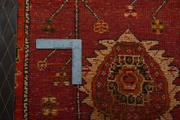 Backside of handmade 2000s Shiraz rug showing knot structure and weave density