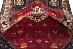 Surface texture of 1970s Shiraz rug with natural Wool and intricate pattern
